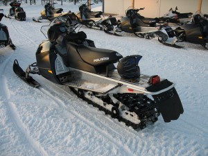 Some snowmobiles can move at speeds up to 150 mph (240 km/h). Iditarod sled dogs have been killed by snowmobiles. Photo attributed to janandersen_dk on flickr